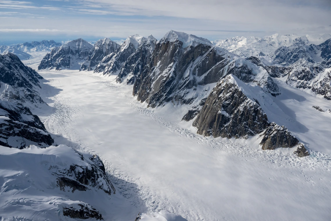 The Ruth Glacier originates beneath the summit of Denali and flows through deep granite valleys.